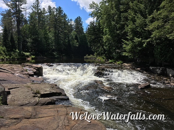 A view of Monument Falls while standing on the rocks along the river